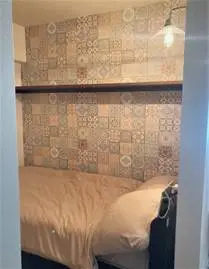 グリーンの濃淡コーディネートで深みのあるインテリアに