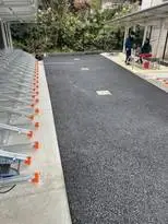 アスファルト舗装と駐輪場・駐車場の新設工事