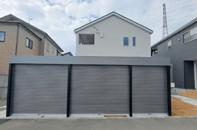 愛車を守る大型シャッター付きガレージ新設