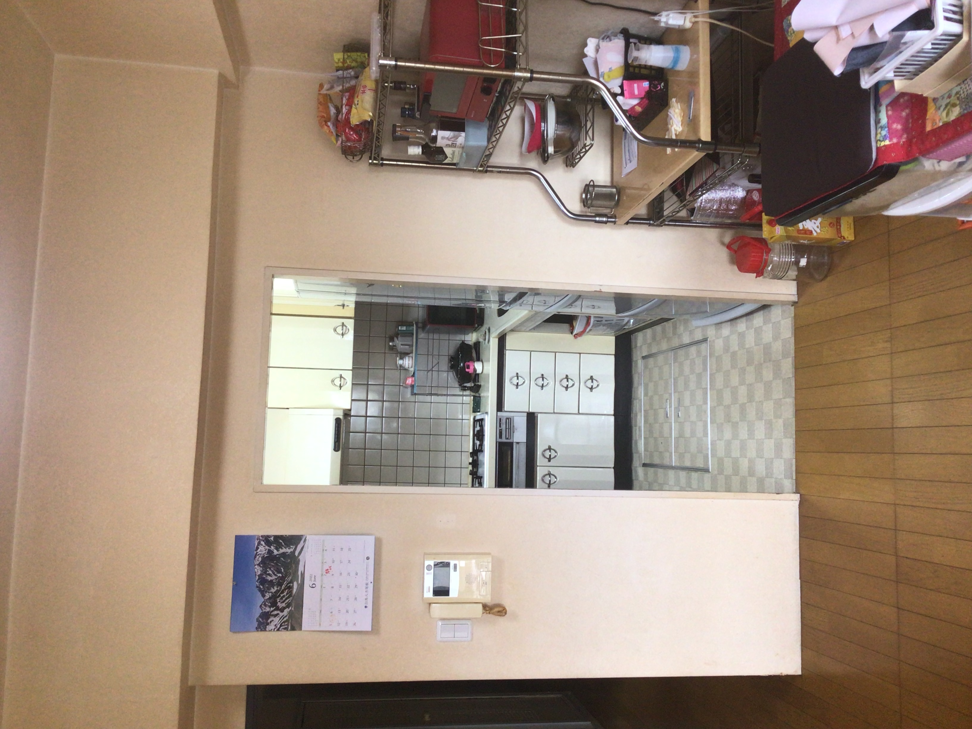 壁を一部撤去でリビングを拡張・L型からI形キッチン変更