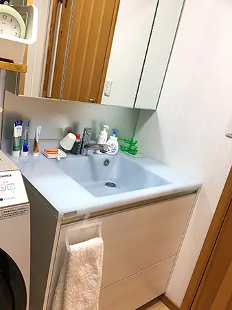 水色がアクセント・古い水まわり設備を一新