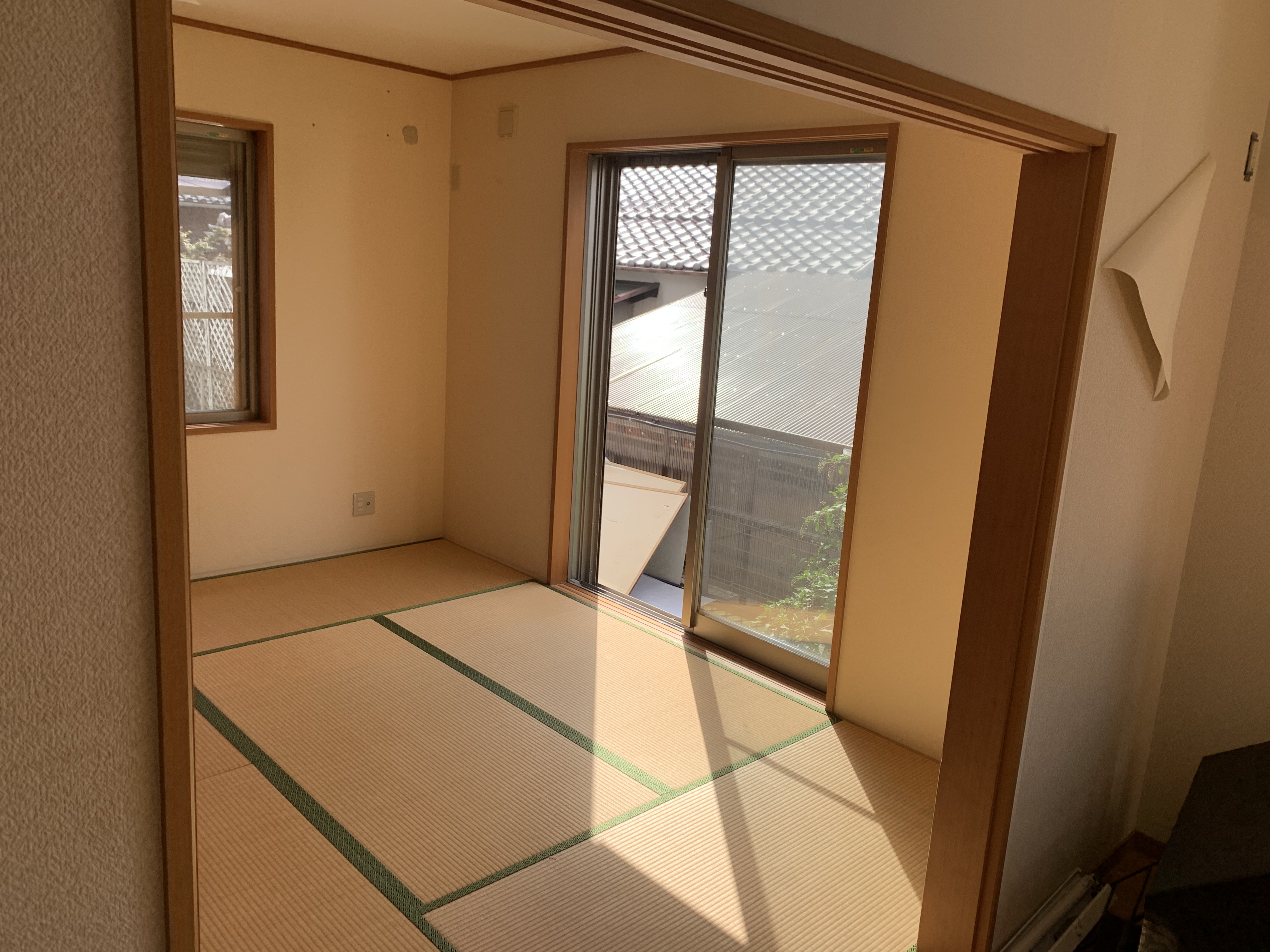 使い勝手の悪い和室を繋げて広々リビングへ