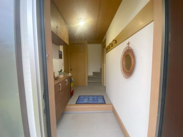 夫婦をつなぐ玄関ドア